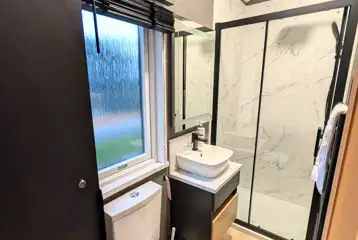 Superior glamping cabin ensuite bathroom (towels not provided but can be hired)