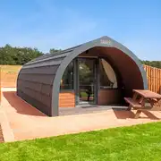 Glamping pod and picnic bench at Tweedbraes Glamping - Paxton House