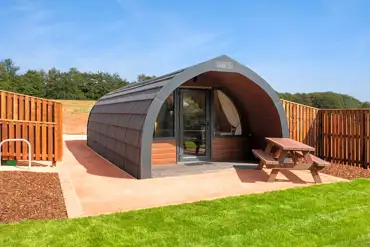 Glamping pod and picnic bench at Tweedbraes Glamping - Paxton House