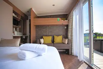 Cabin with a double sofa bed, single bunk and bedding Cabin with a double sofa bed, single bunk and bedding