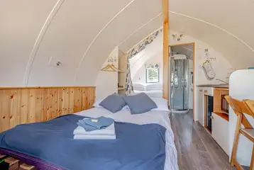 The Wonneys with the sofa bed made up
