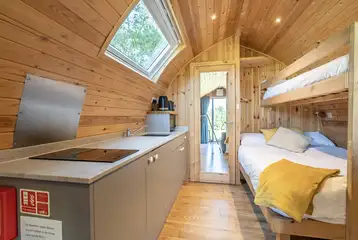 Five person pod kitchen with a sink, microwave, fridge and kettle Five person pod kitchen with a sink, microwave, fridge and kettle