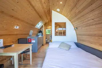 Five person glamping pods with a double bed, single bunk and double sofa bed Five person glamping pods with a double bed, single bunk and double sofa bed