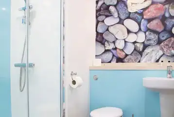 Deluxe ensuite beach hut with hot tub bathroom Deluxe ensuite beach hut with hot tub bathroom