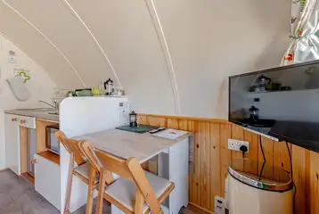 Small dining area with a smart TV