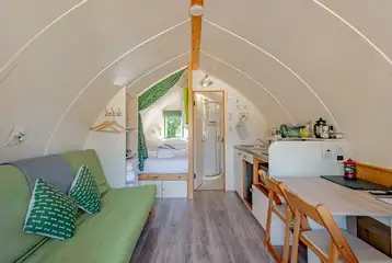 Bare Bones with a king bed, double sofa and drop-down single bunk