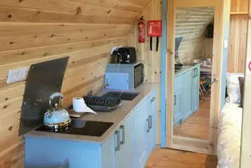 Glamping pod kitchen area