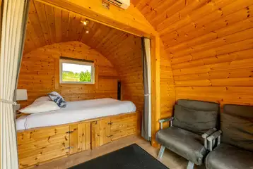Camping pods with a double bed, kitchen unit and sofa bed Camping pods with a double bed, kitchen unit and sofa bed