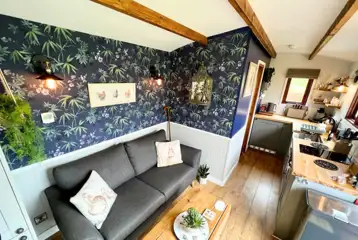 Willow glamping lodge sofa and kitchen Willow glamping lodge sofa and kitchen