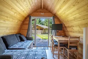 Bambi ensuite glamping pod dining area and TV Bambi ensuite glamping pod dining area and TV