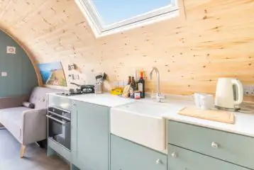 Large Gold glamping pod kitchenette