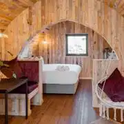 Luxury glamping pod interior 
