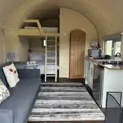Family glamping pod with hot tub interior
