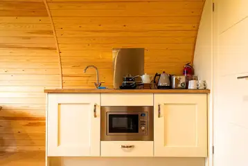 Glamping pod kitchen with a fridge, sink, toaster, microwave Glamping pod kitchen with a fridge, sink, toaster, microwave