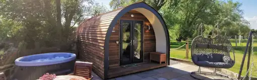 Luxury wooden glamping pod